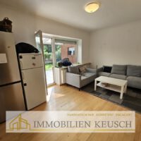 Wohnzimmer mit Zugang zum Garten