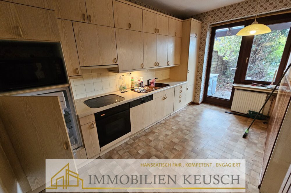 Küche mit Zugang zum Garten